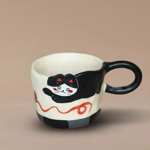 Hand-Pinched Playful Black Cat Ceramic Mug